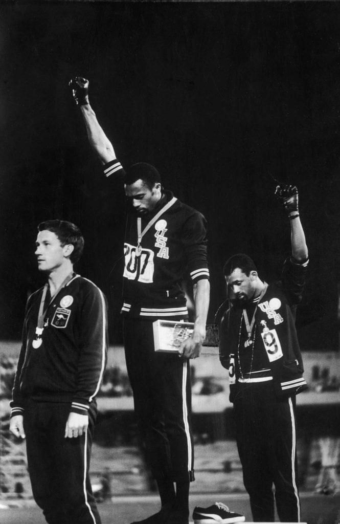 black and white photo of "Black Power" salute at the 1968 Mexico Olymipics